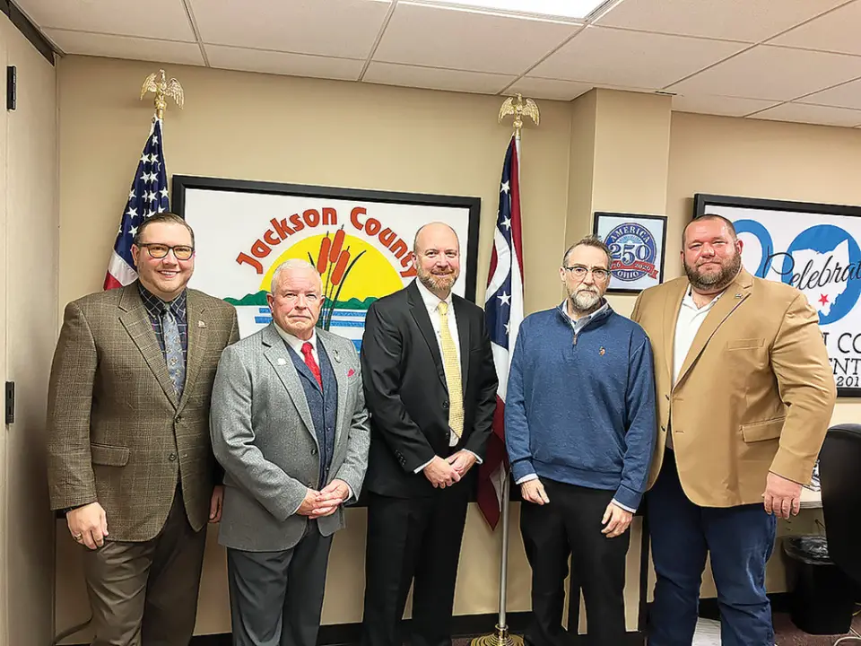During their meeting on Tuesday morning, Dec. 31, the Jackson County Commissioners accepted the resignation of Jackson County Prosecuting Attorney Randy Dupree and appointed Jackson attorney Trent Douthett to serve as Acting Prosecutor. Effective Jan. 1, Dupree will assume the judgeship of the Jackson County Municipal Court. Pictured from the left are County Commissioners Jon Hensler and Paul Haller, Acting Jackson County Prosecuting Attorney appointee Trent Douthett, outgoing Jackson County Prosecuting Attorney and incoming Jackson County Municipal Court Judge Randy Dupree and Jackson County Commissioner Donnie Willis. (Telegram Photo by Pete Wilson)